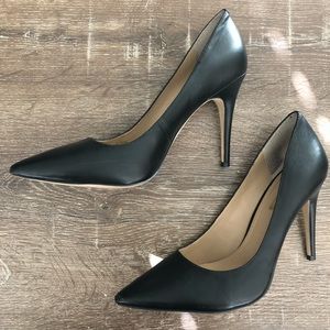 Black pointed toe heels